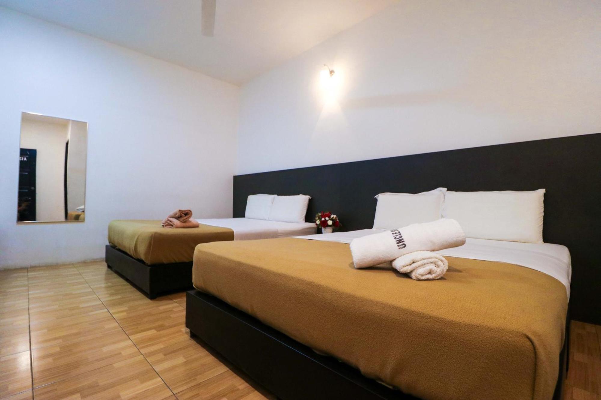 Uncle Guesthouse Куала-Тренгану Екстер'єр фото